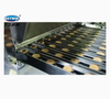 M&aacute;quina para fabricar galletas de chocolate Skywin, dep&oacute;sito de mermelada y t&uacute;nel de enfriamiento
